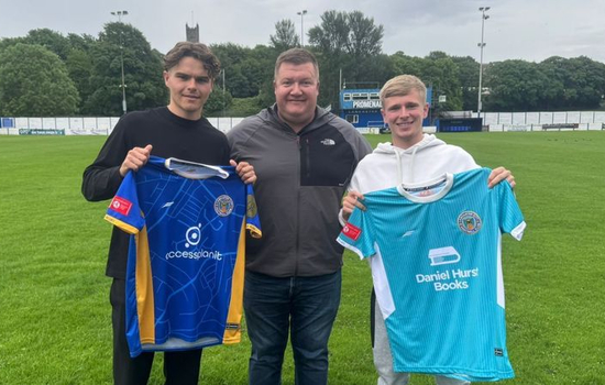 Lancaster welcome new midfield duo